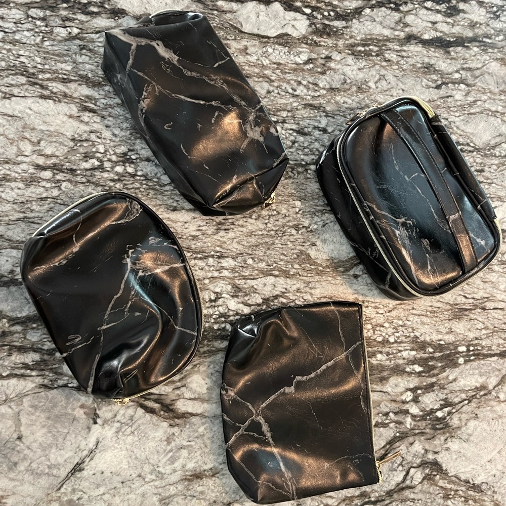 Four makeup bags set